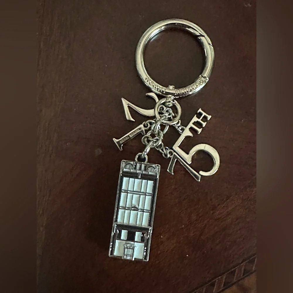 Gorgeous Henri Bendel Iconic 712  5th Avenue Gold Keychain Fob Bag Charm VGUC